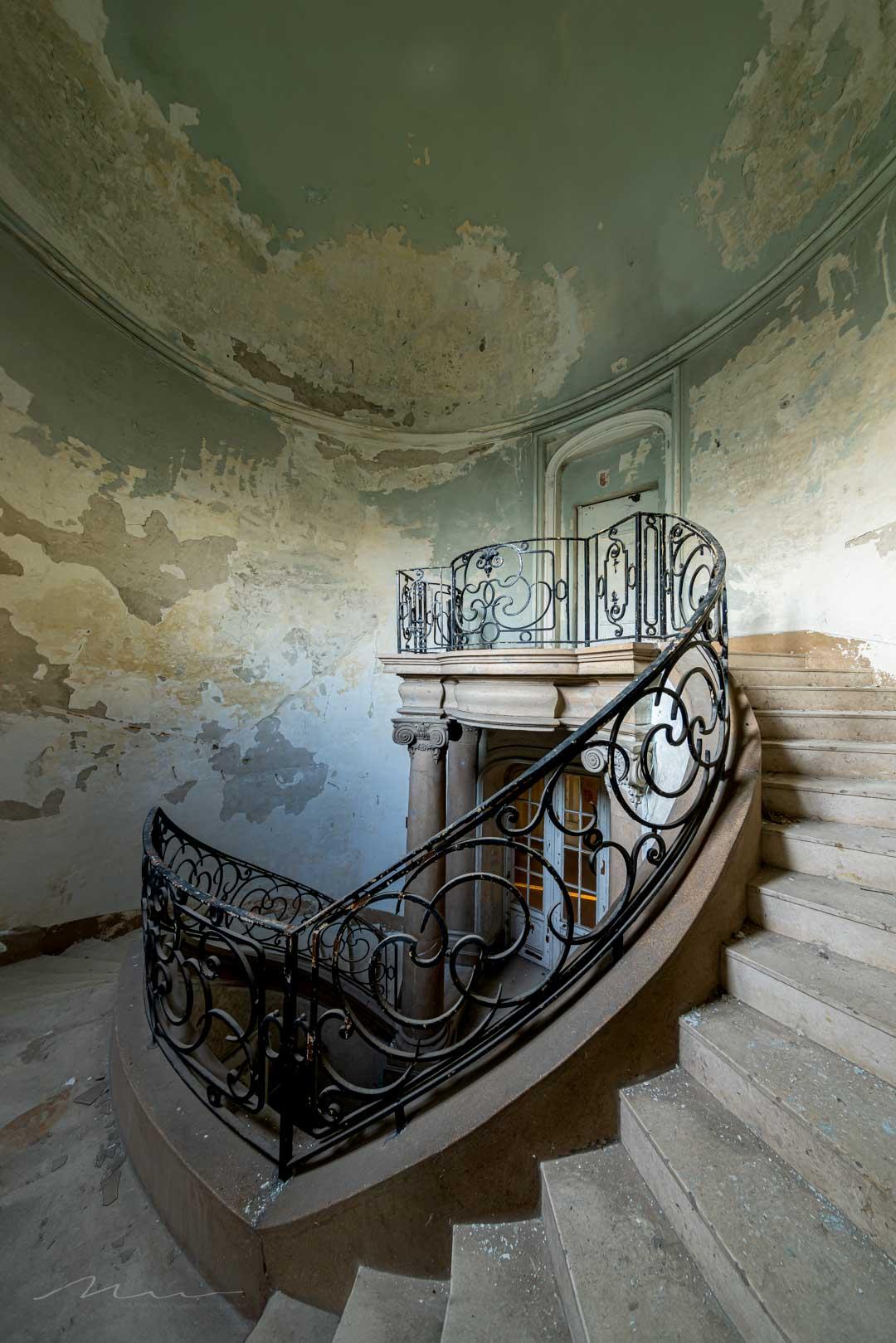 Staircase in an abandoned villa